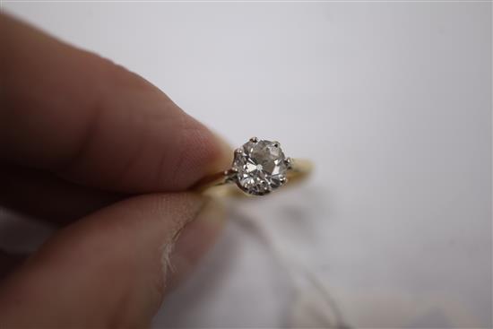 An 18ct gold and solitaire diamond ring, size L.